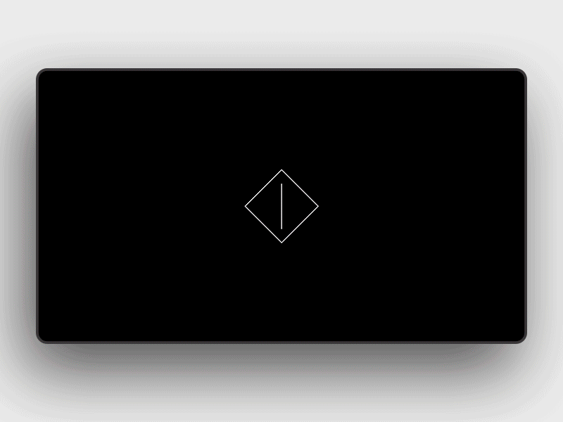 Animated black screen with rotating diamond-shaped loading icon centered on a laptop display.