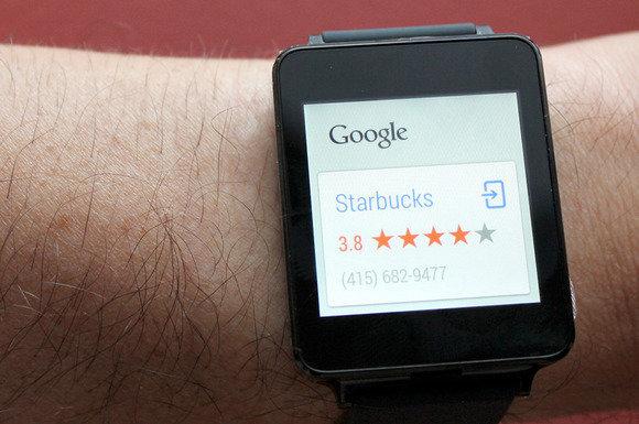 Smartwatch displaying Google search result for Starbucks with 3.8-star rating and contact number.