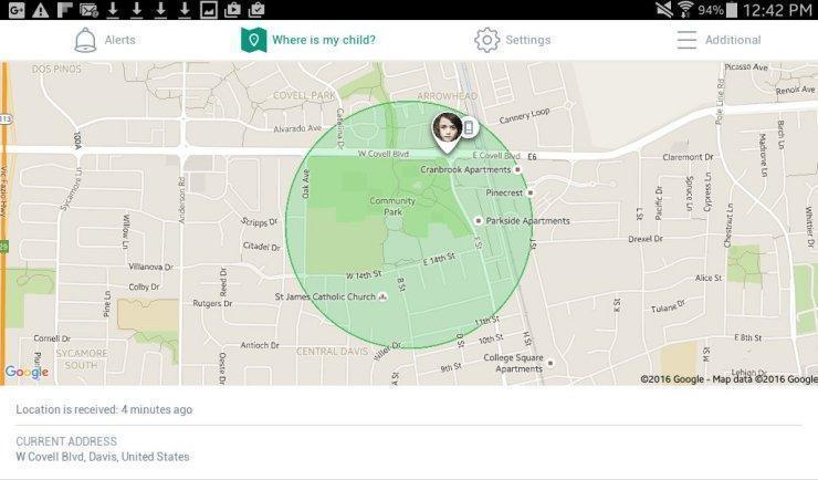 Mobile app screen showing a child's real-time location on a map within a green geofenced area in Davis, California, with options for alerts, settings, and address details.